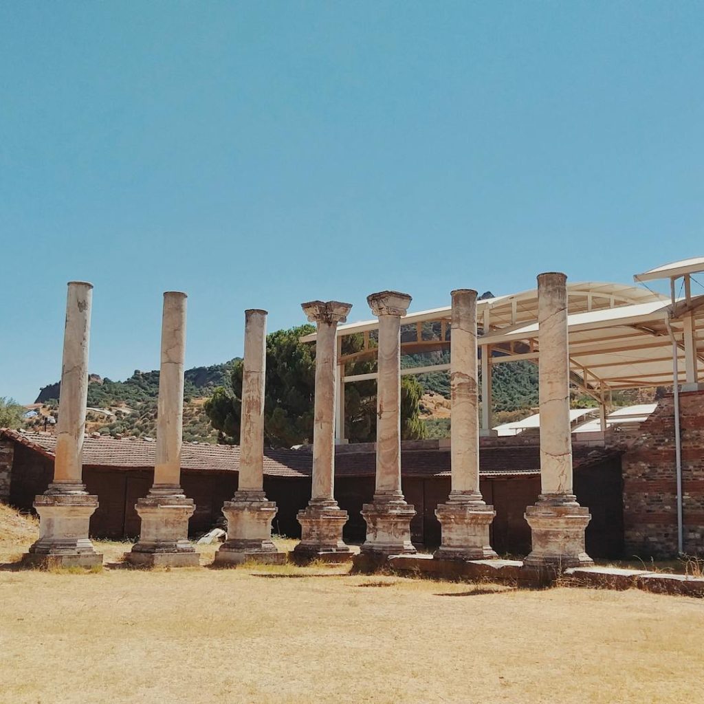Historic stone columns at archaeological site in Manisa, Türkiye.