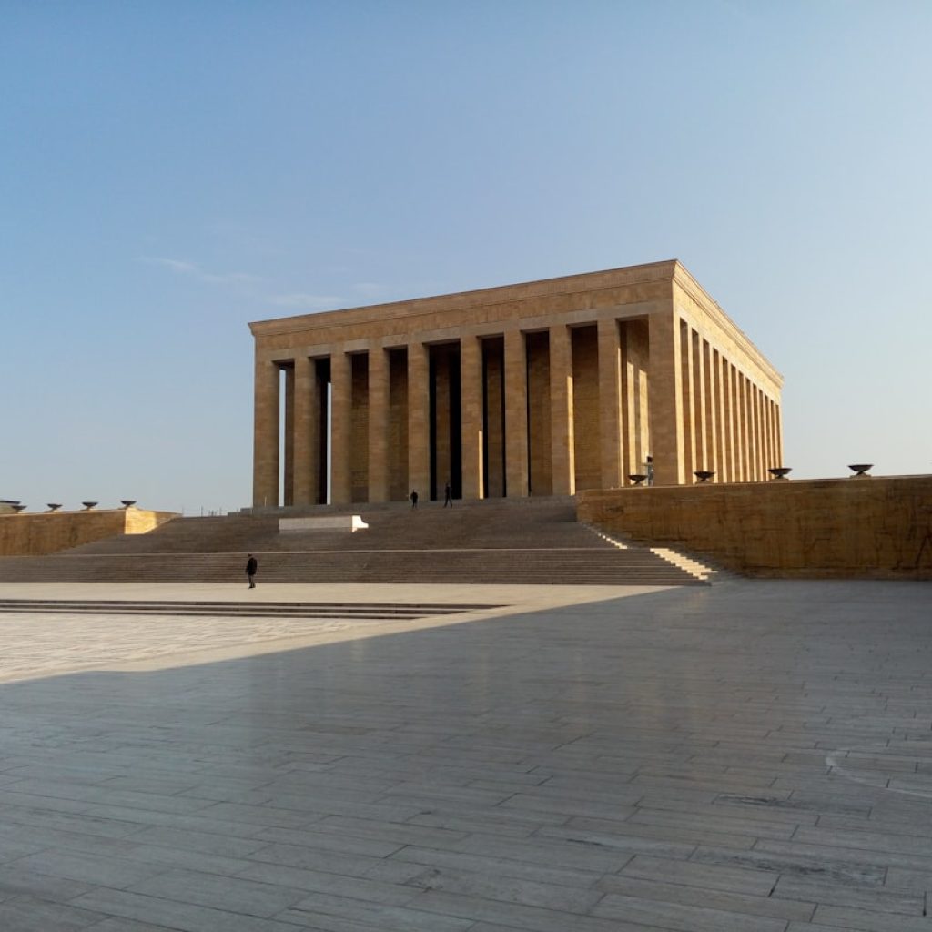 brown concrete building under blue sky during daytime