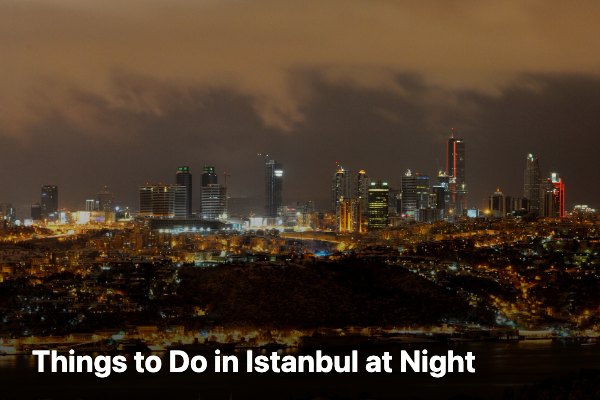 The Istanbul skyline lit up after dark across the water