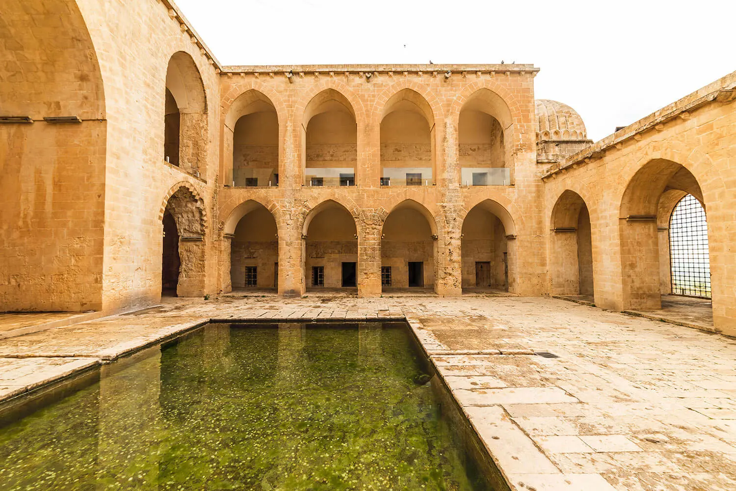 Arcaded courtyard and pool of the Kasımiye Madrasa