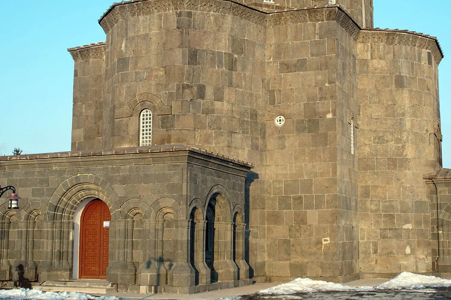 The basalt walls and portal of Kümbet Mosque