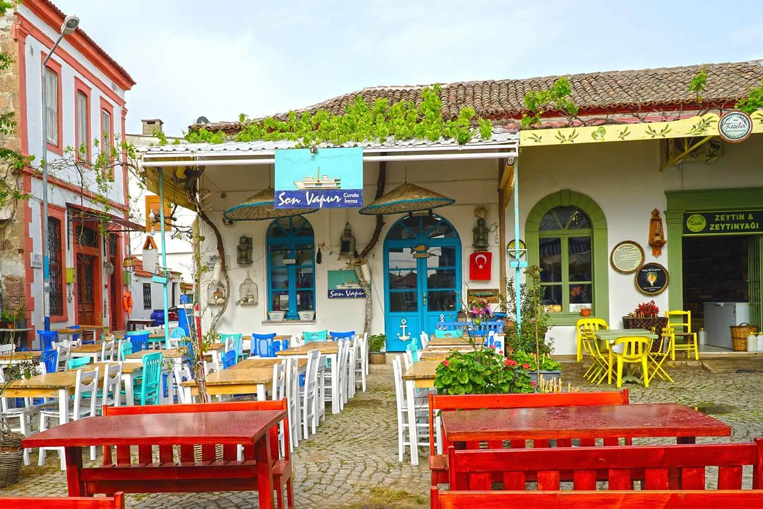 Café tables on a lane in Cunda