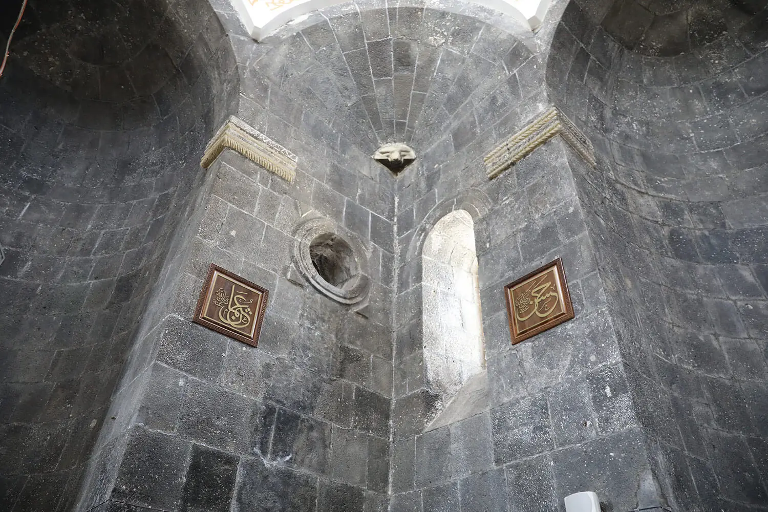 Carved inscriptions inside the dome of Kümbet Mosque