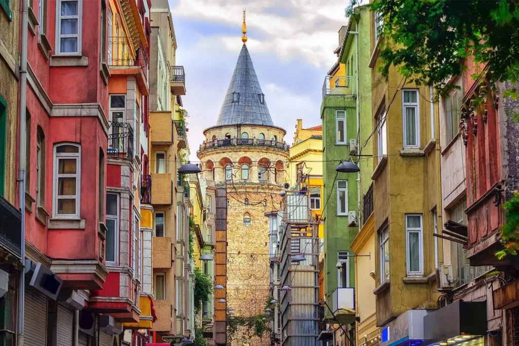 Galata Tower between colourful houses in Galata