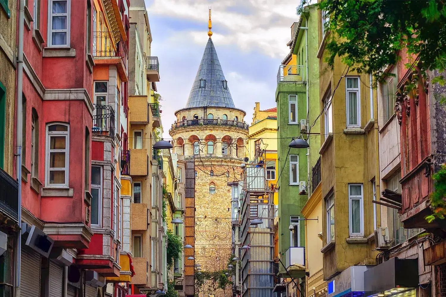 Galata Tower between colourful houses in Galata