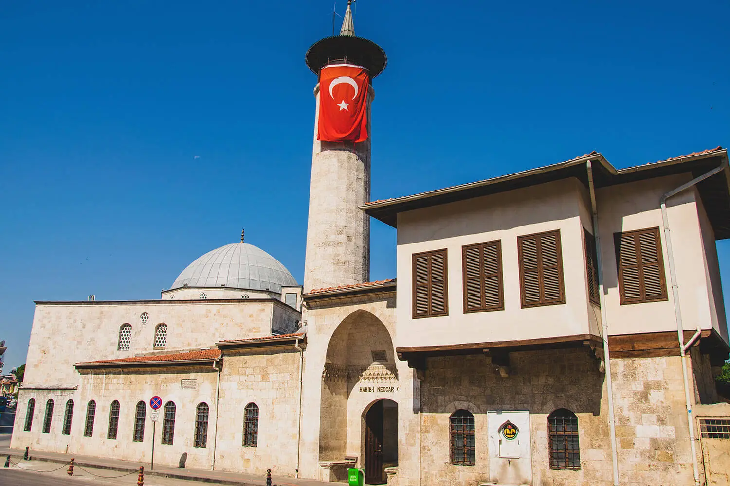The Habib-i Neccar Mosque and an Ottoman house, photographed before 2023