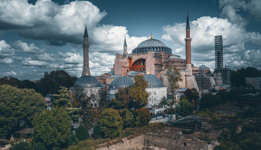 A breathtaking aerial view of Hagia Sophia under a dramatic sky in Istanbul, Türkiye