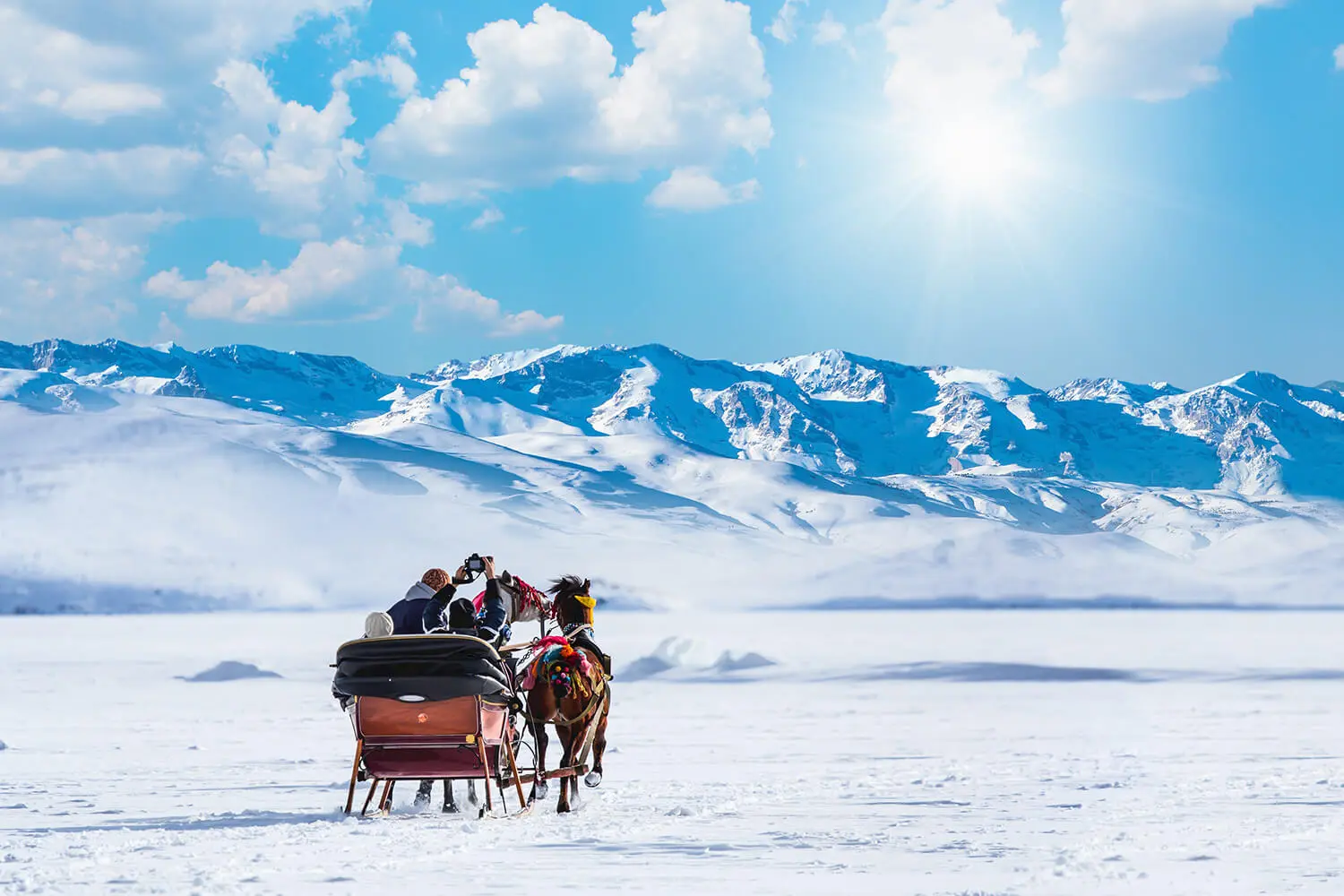 A horse-drawn sleigh on the frozen plain near Kars