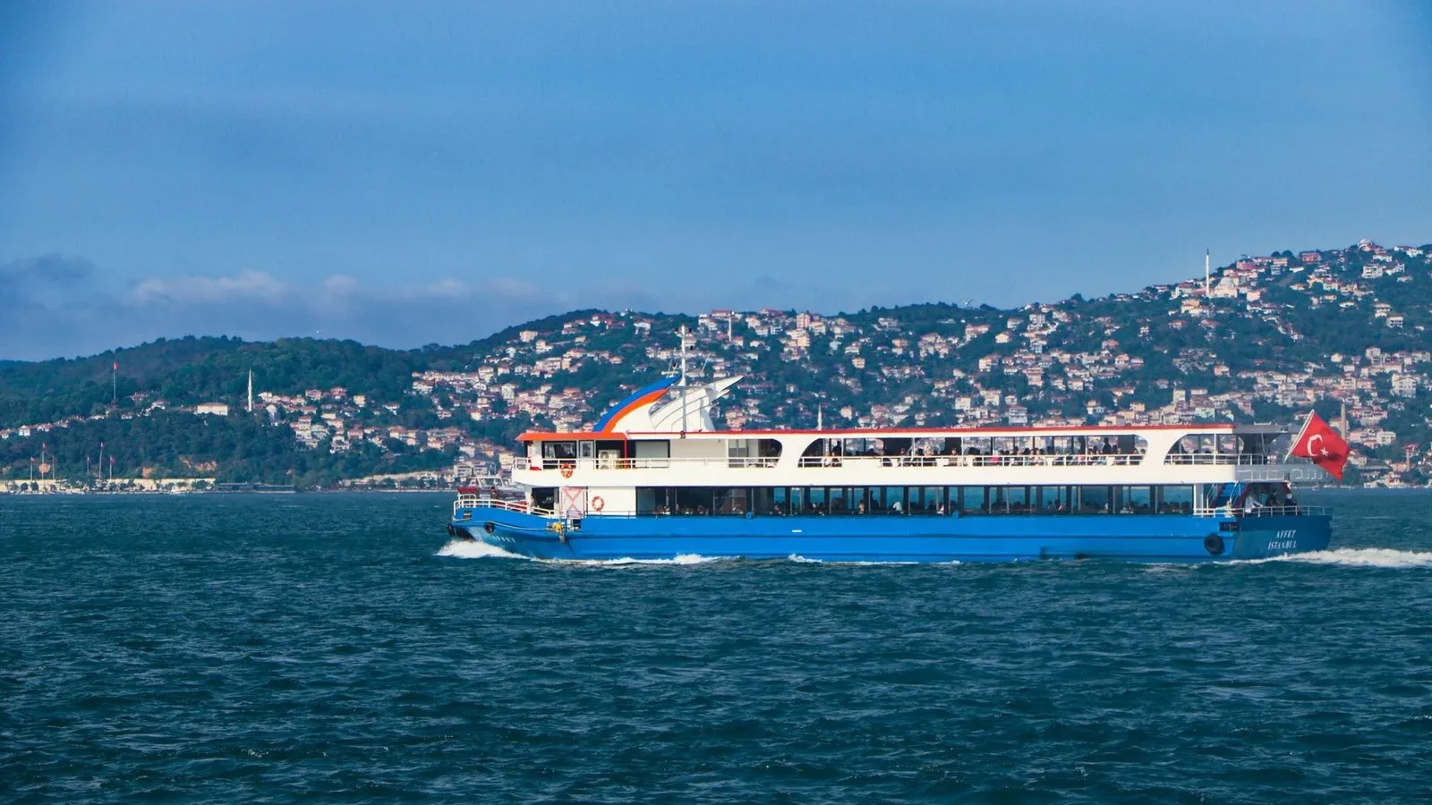 Ferry cruising on the Bosphorus with the Istanbul skyline