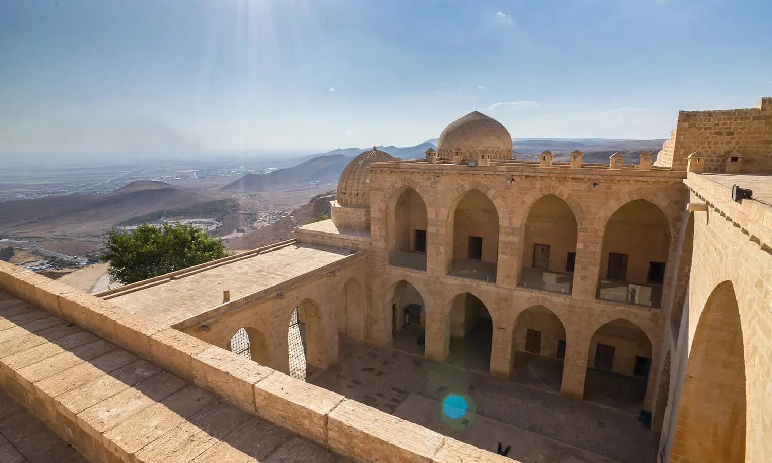 Kasımiye Madrasa with the Mesopotamian plain behind