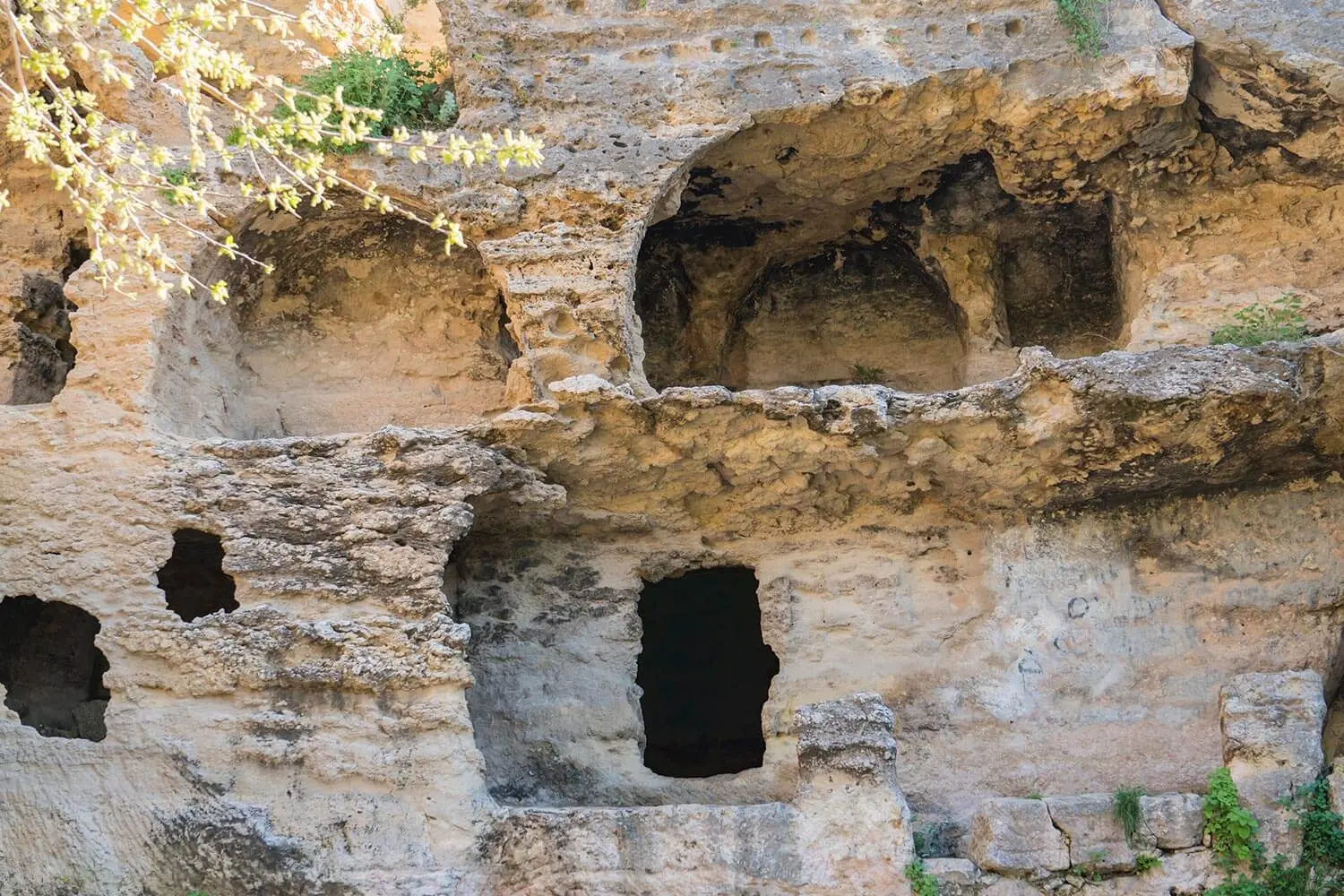 Niches cut into the cliff at Beşikli Cave