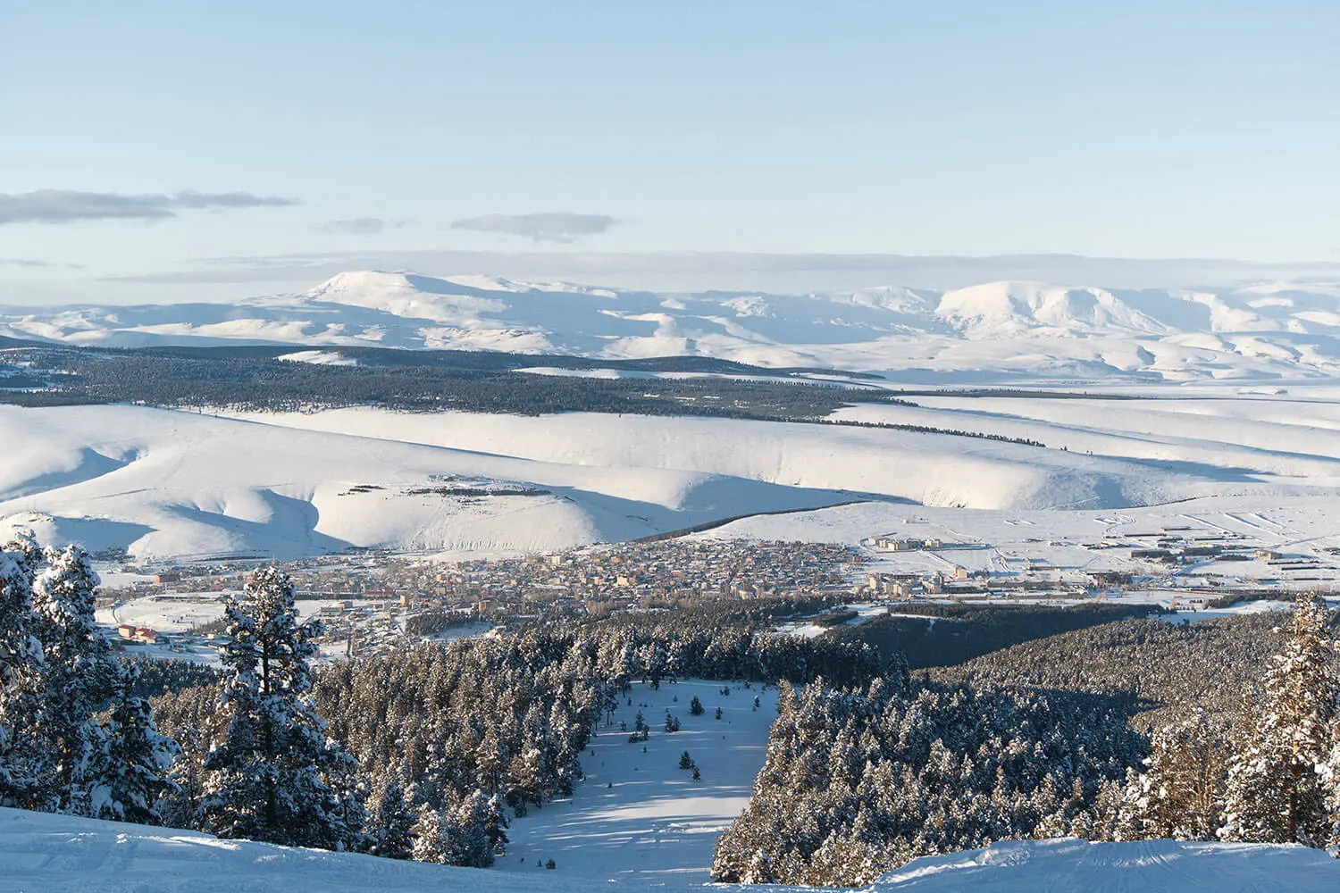 Snow-covered forest and hills around Sarıkamış