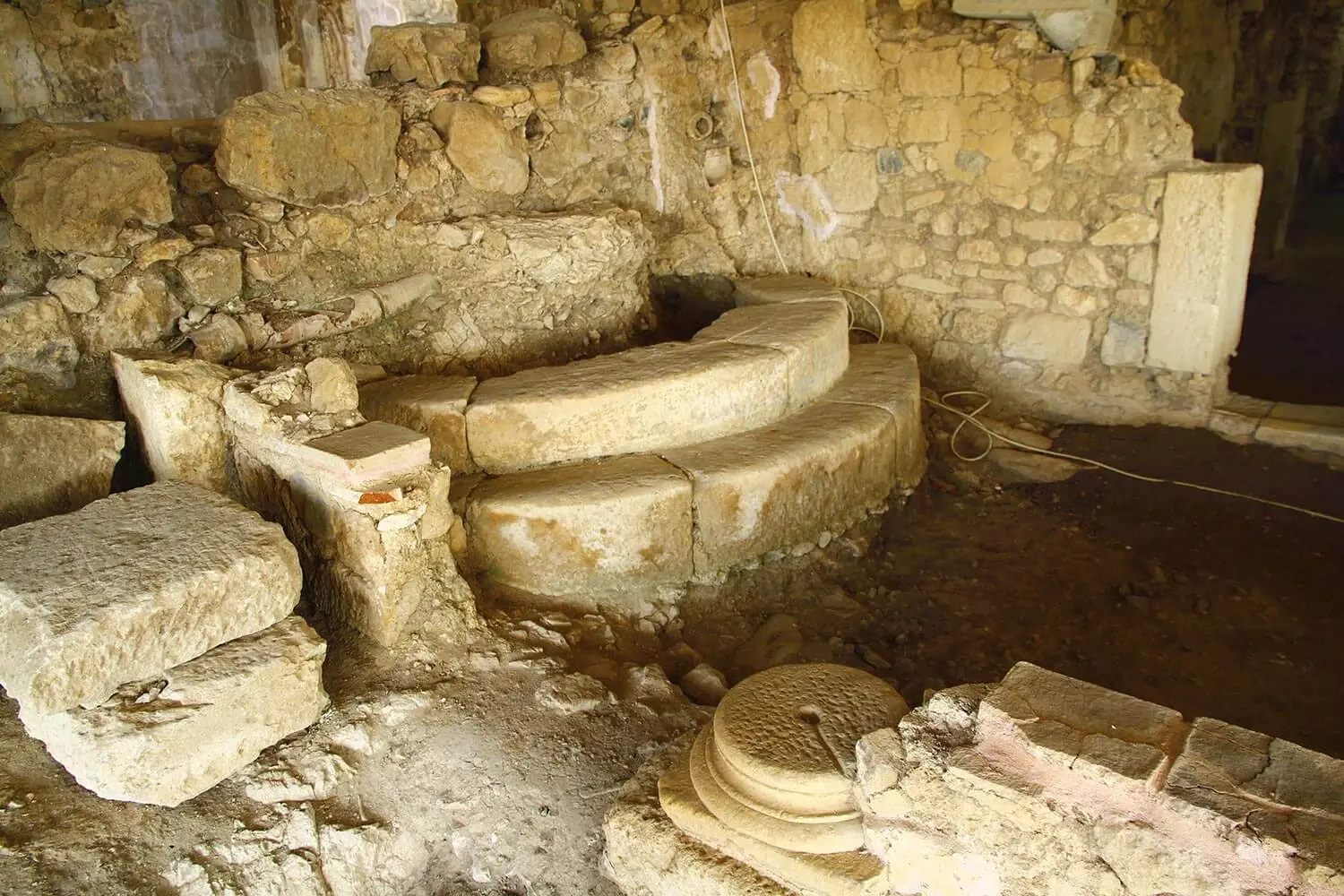 Stone remains under the shelter at Antandros