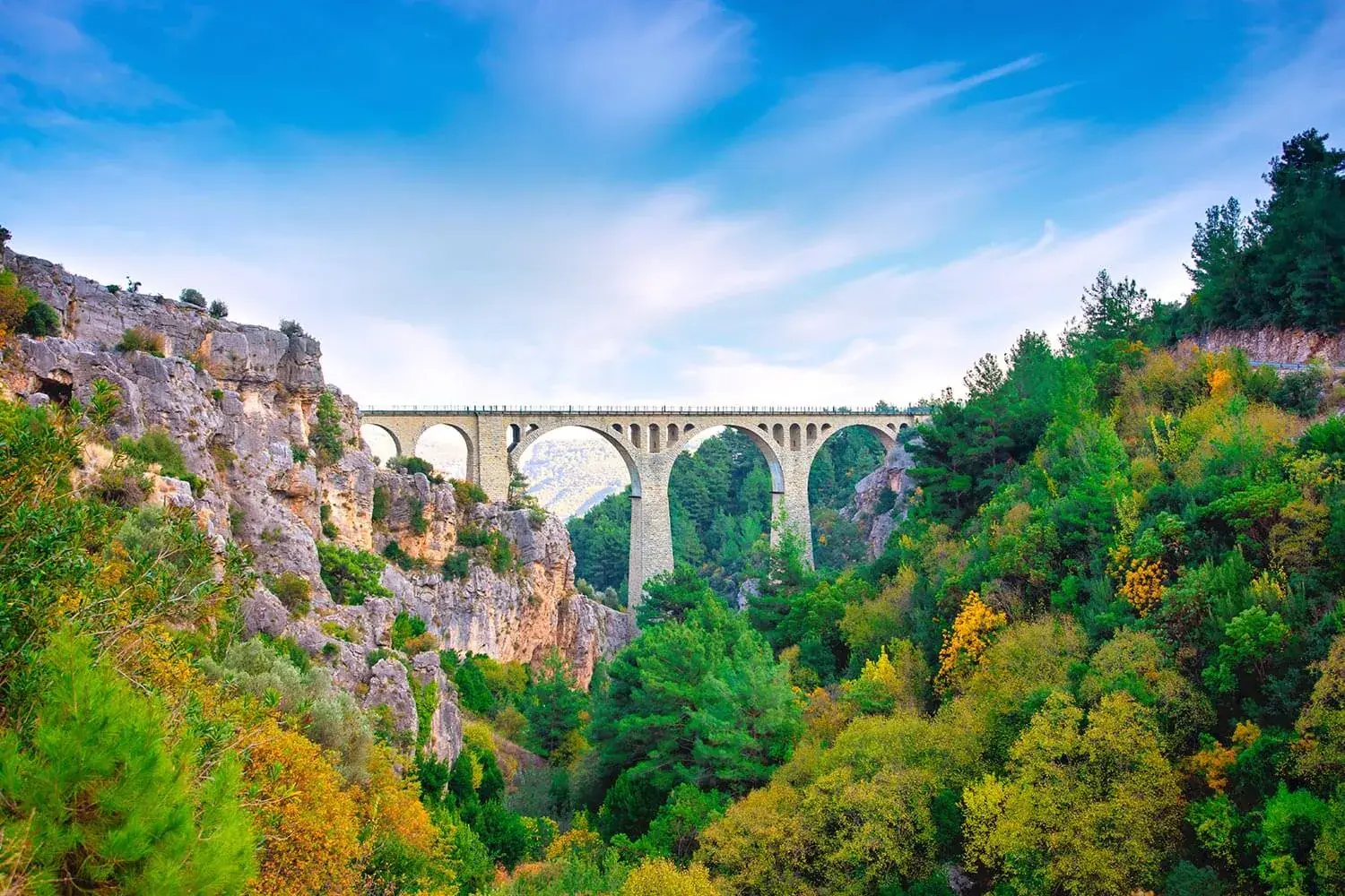 Varda Bridge spanning a green gorge near Adana