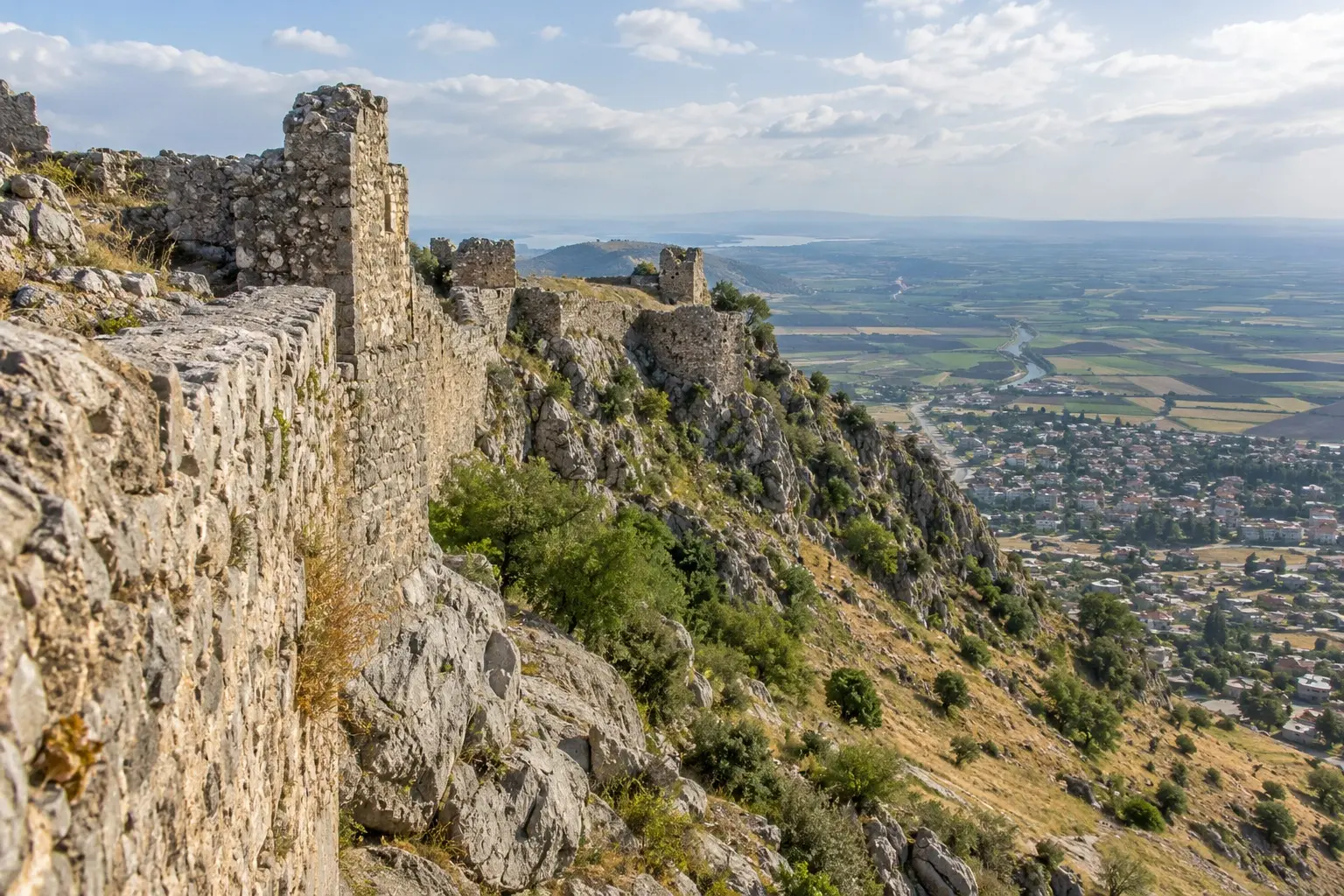 The walls of Kozan Castle along the cliff