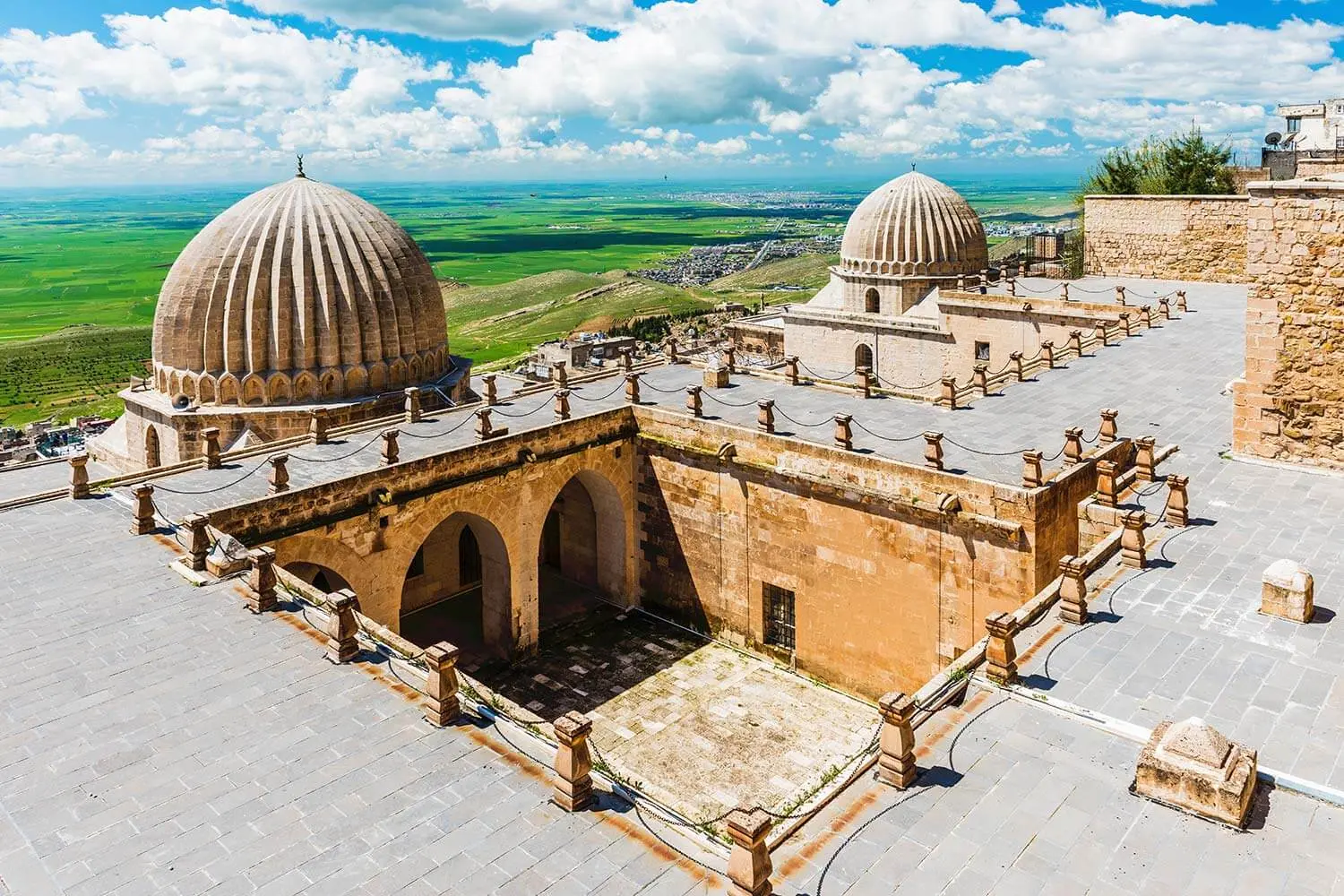 The Zinciriye Madrasa's ribbed domes and courtyard, looking towards the plain